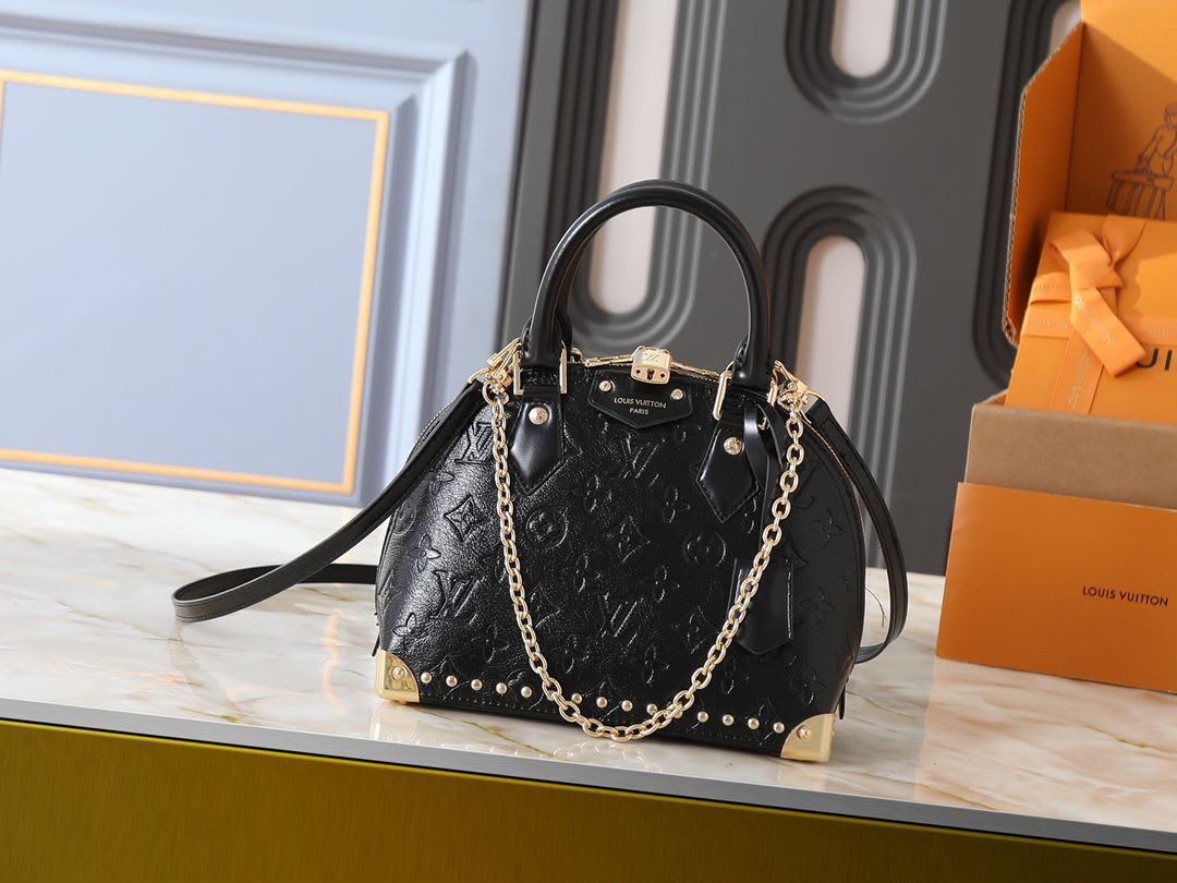 Embossed Monogram Top Handle Chain Bag