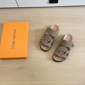 Louis Vuitton Isola Comfort Sandals in beige.