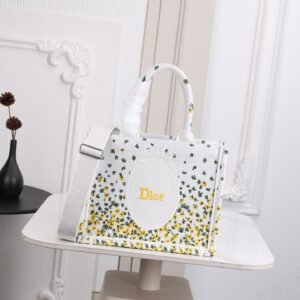 Medium Dior Book Tote with Strap featuring the Buttercup Dior Embroidery and a White Dior Médaillon.